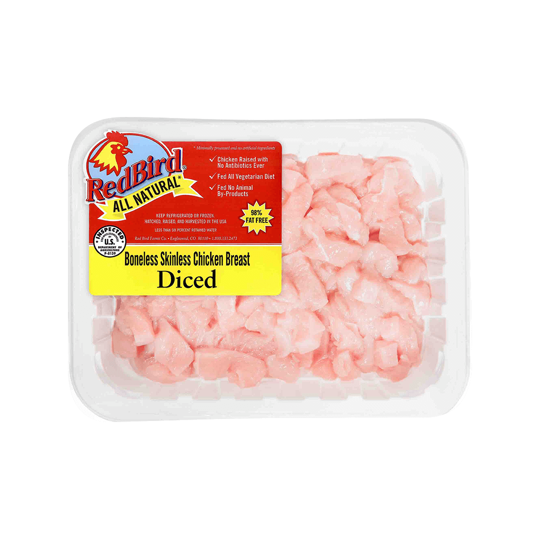 Red Bird diced boneless skinless chicken breast in a white tray with yellow label.